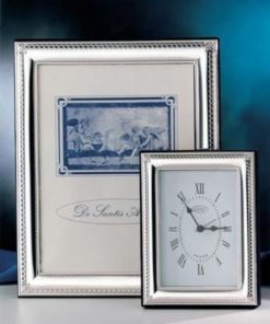 CORNICE IN ARGENTO CM 6X9 FONDO LEGNO